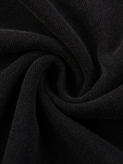 Close-up of black fabric with a textured pattern