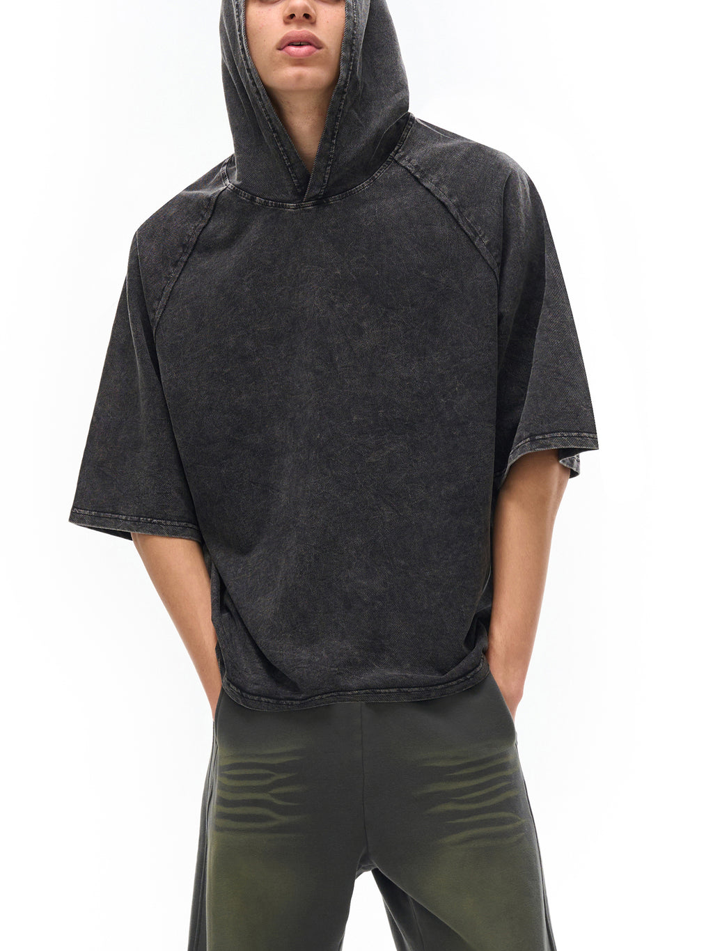 Model wearing VÉRON Allée du Cygne Noir unisex designer T-shirt 1