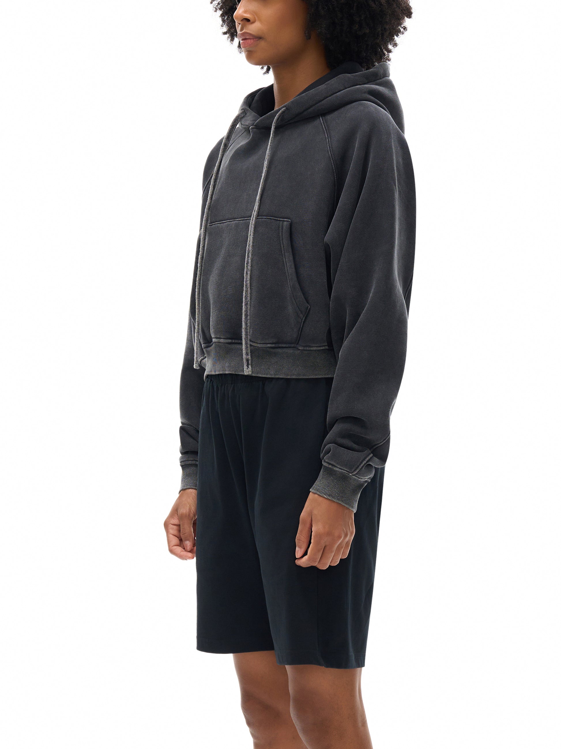Model wearing VÉRON Auriane women’s streetwear hoodie with relaxed fit 4