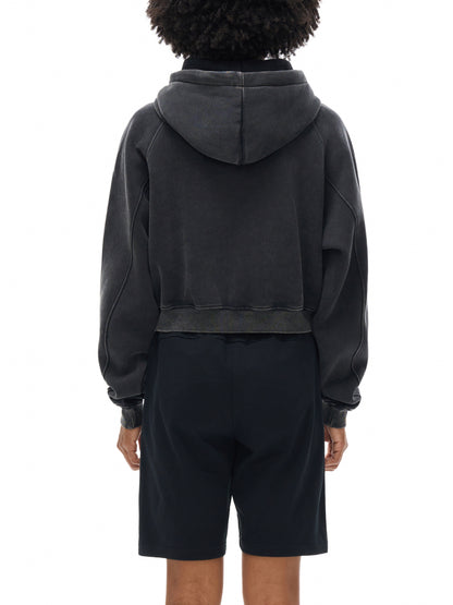 Model wearing VÉRON Auriane women’s streetwear hoodie with relaxed fit 3