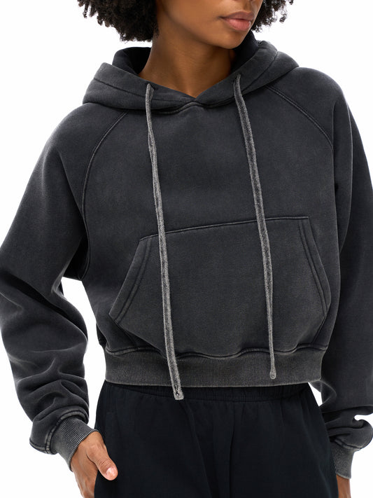 Model wearing VÉRON Auriane women’s streetwear hoodie with relaxed fit 1