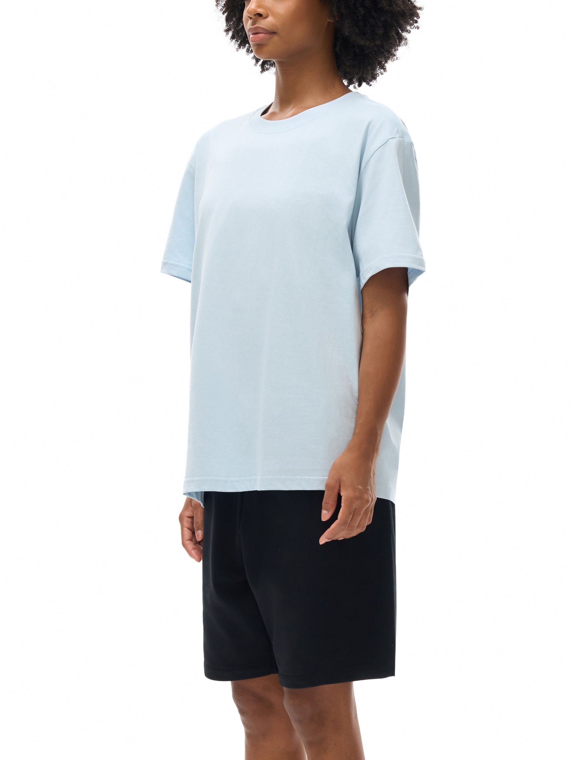 Model wearing VÉRON Paris-inspired streetwear T-shirt 4