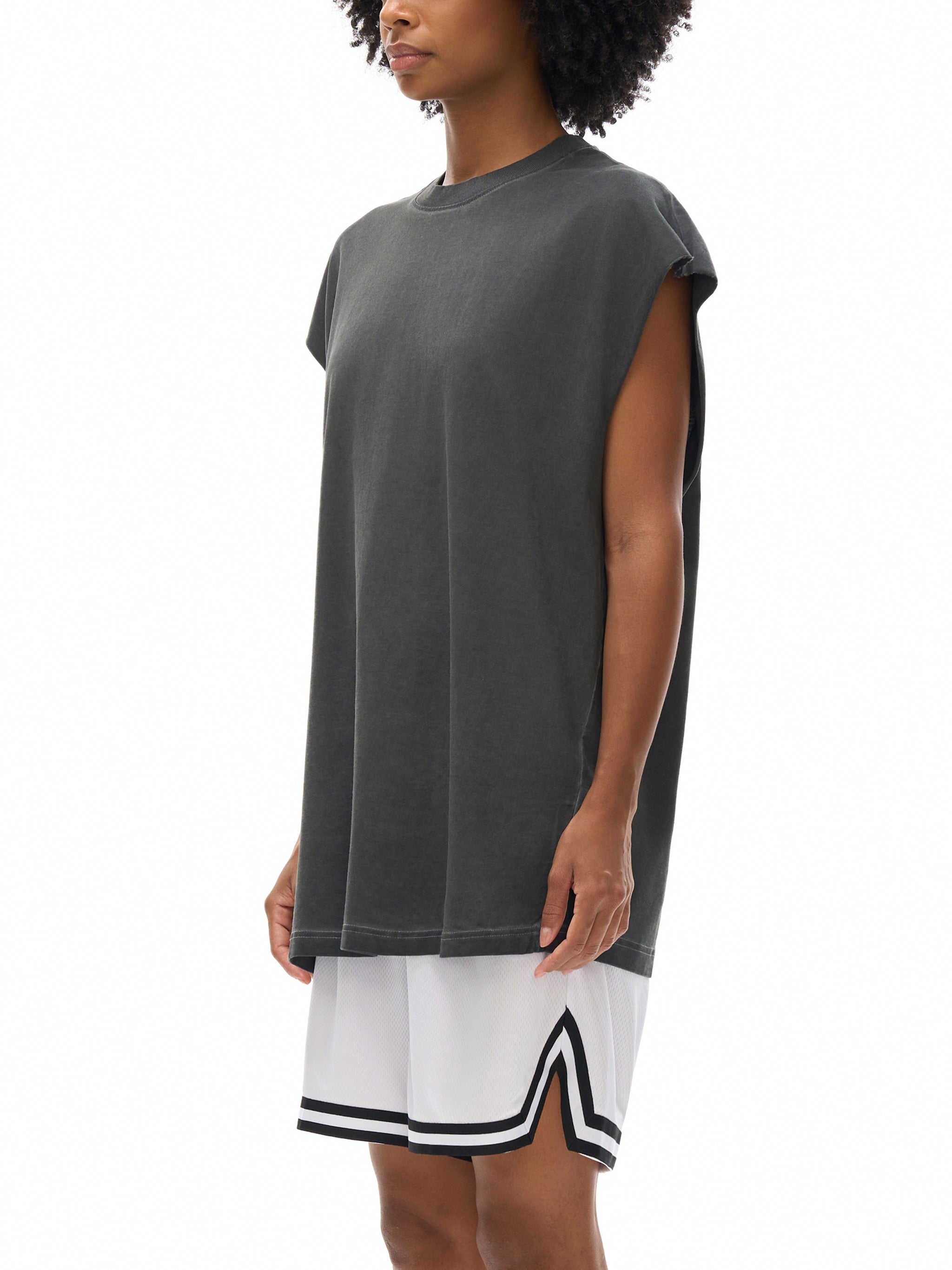 Model wearing VÉRON black flower tank top 6