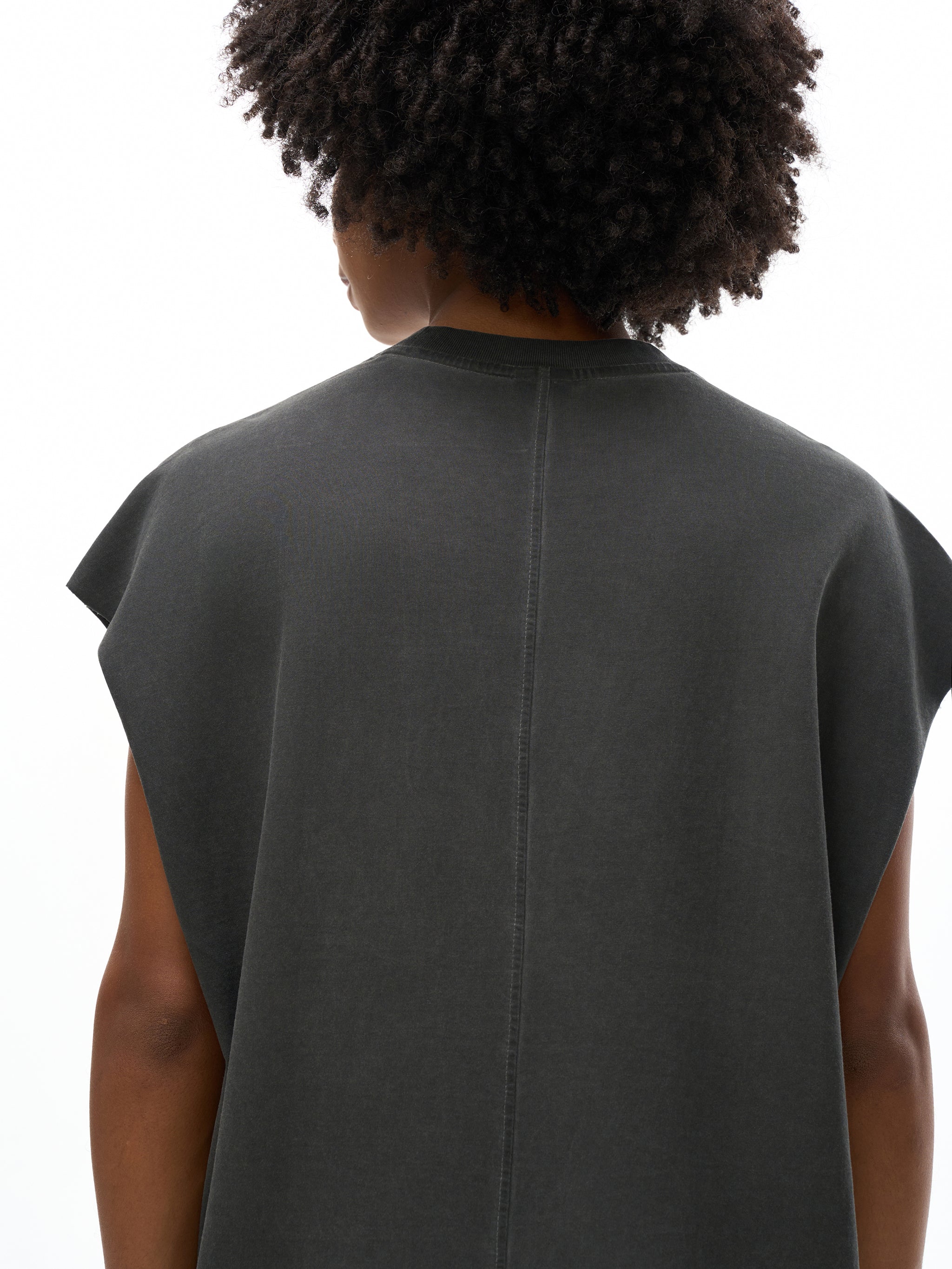 Model wearing VÉRON black flower tank top 5