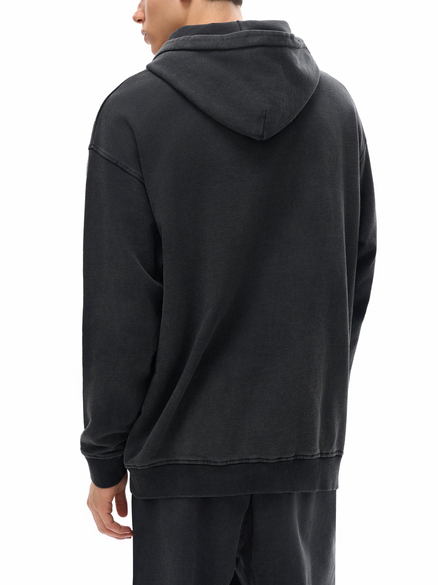 Model wearing VÉRON Le Mirage streetwear hoodie back