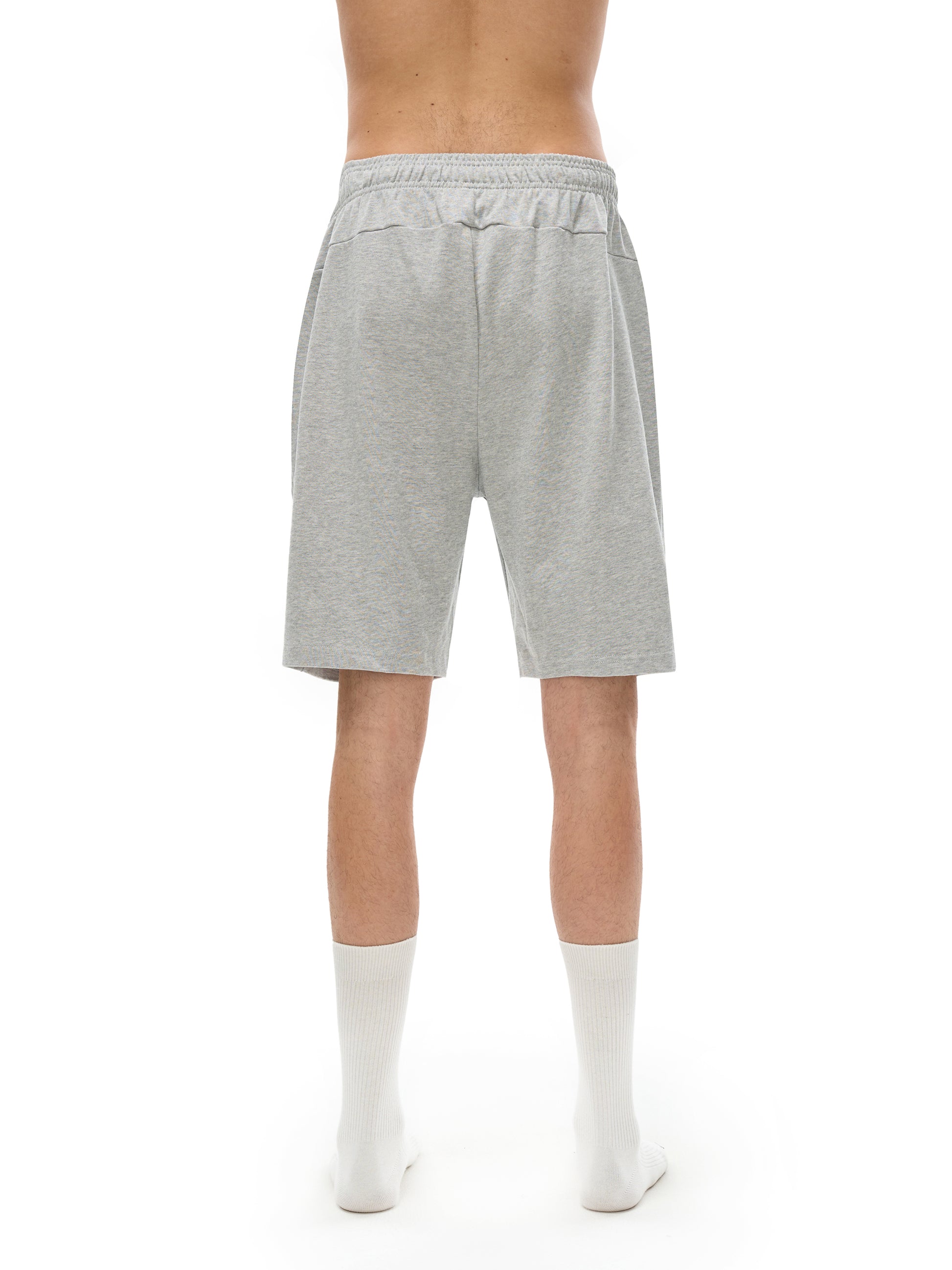 model wearing VÉRON Palatine unisex cotton shorts 2