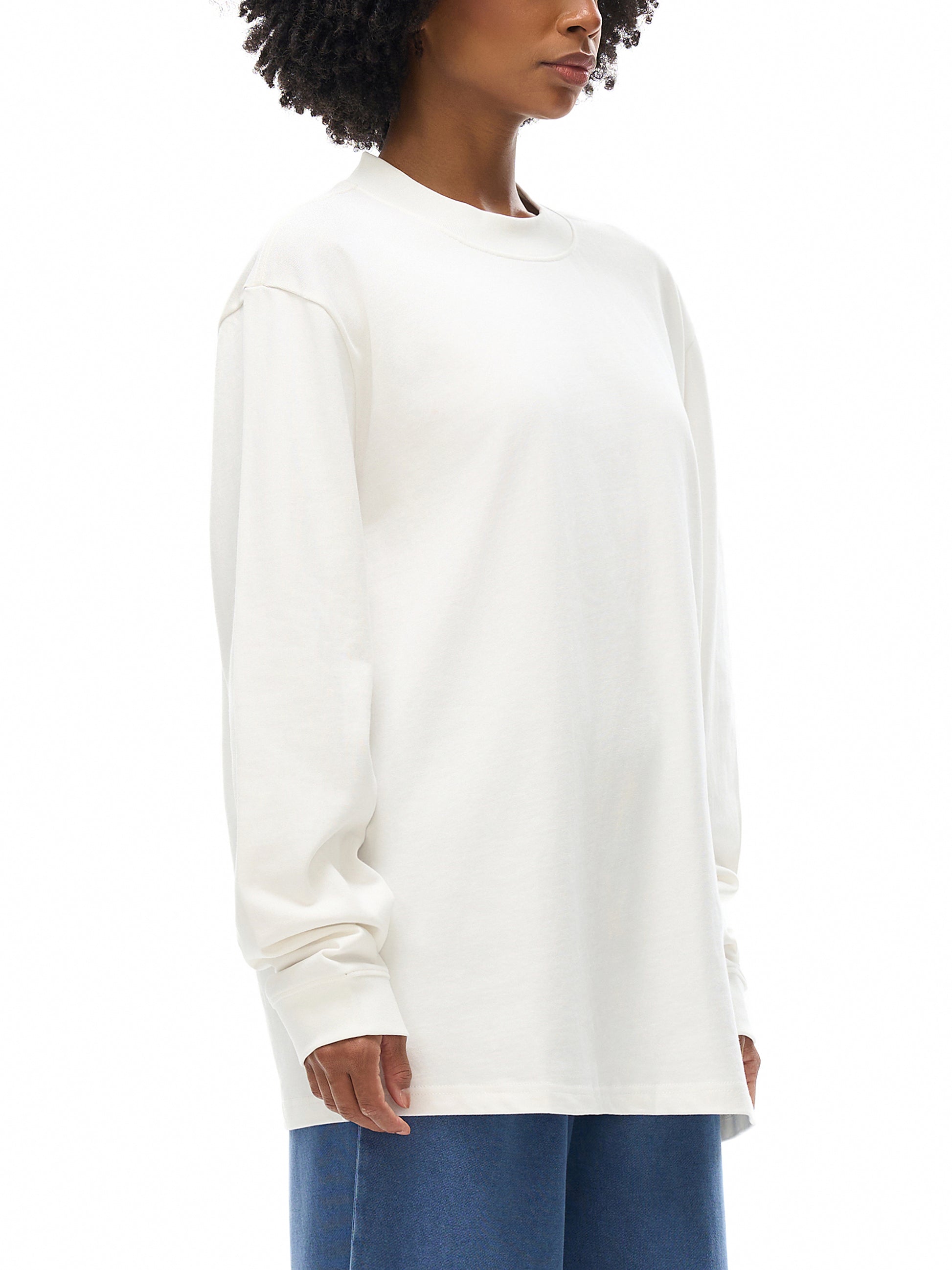 Model wearing VÉRON Boulevard Saint-Germain unisex shirt in streetwear outfit 2