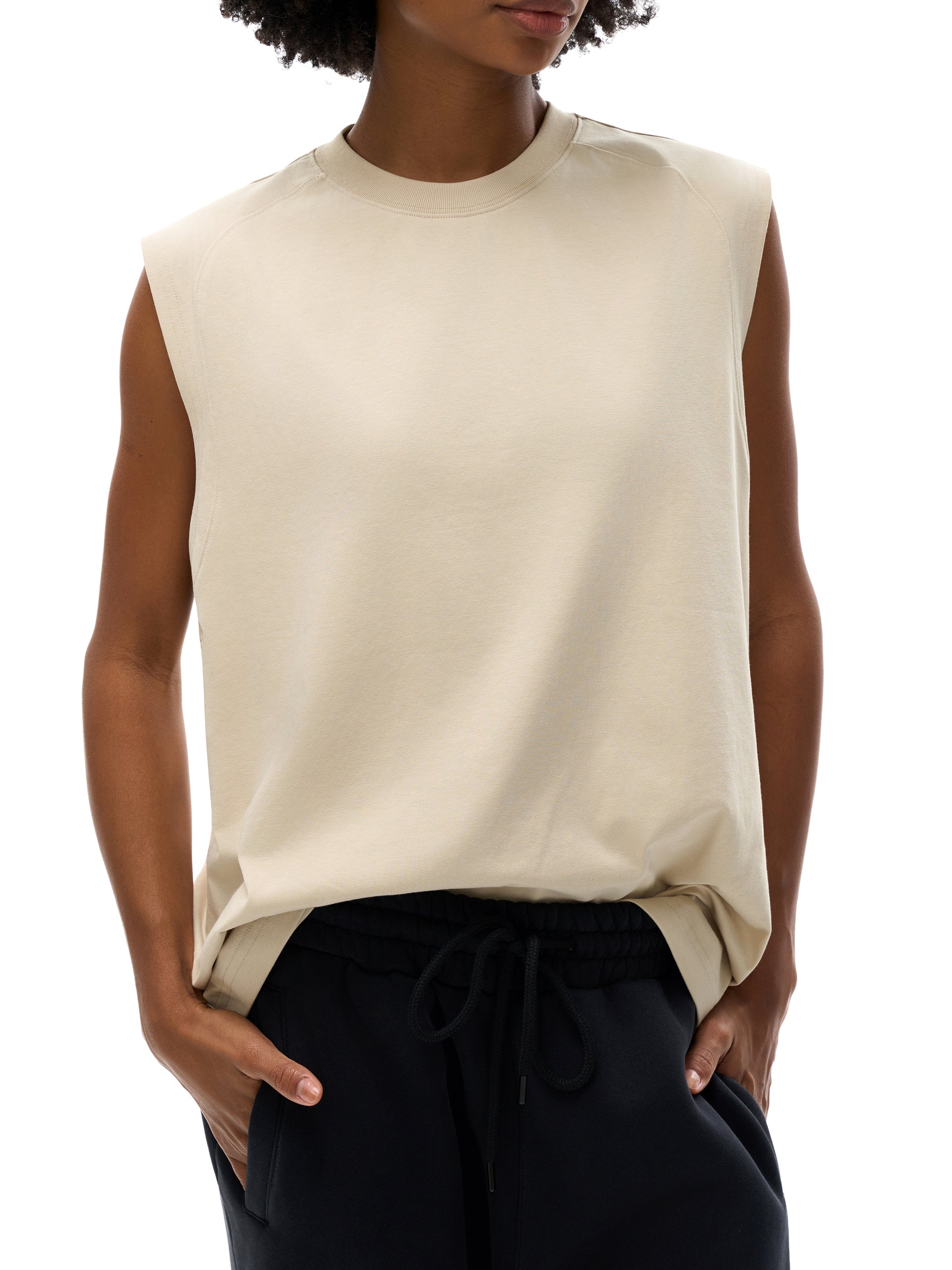 Model wearing VÉRON Élixir Cristal premium unisex tank in urban style 1