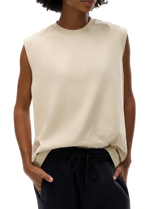Model wearing VÉRON Élixir Cristal premium unisex tank in urban style 1