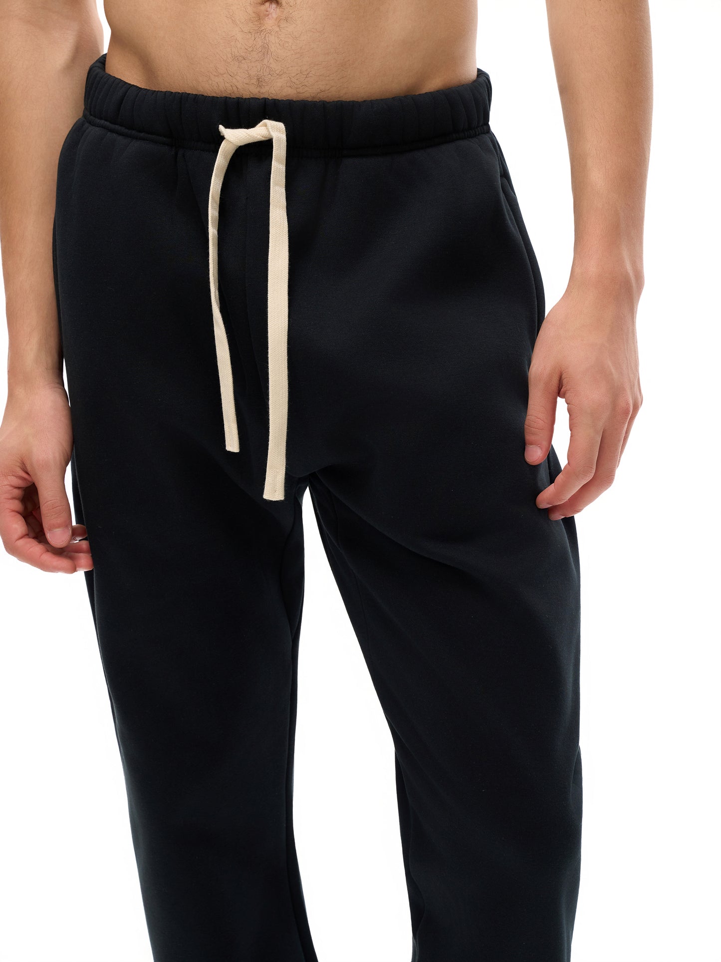 Model styling VÉRON designer sweatpants with modern streetwear fit 3