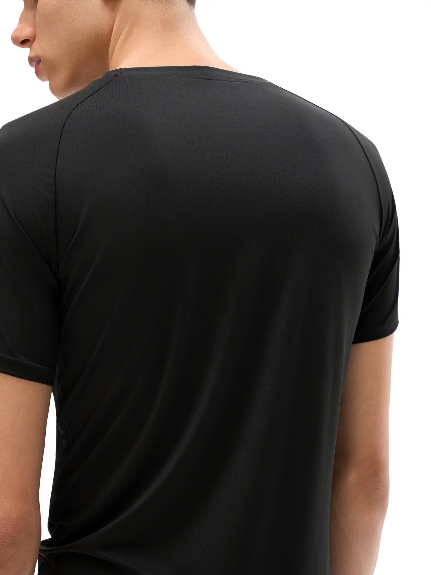Model wearing VÉRON Le PADRE premium athletic streetwear tee