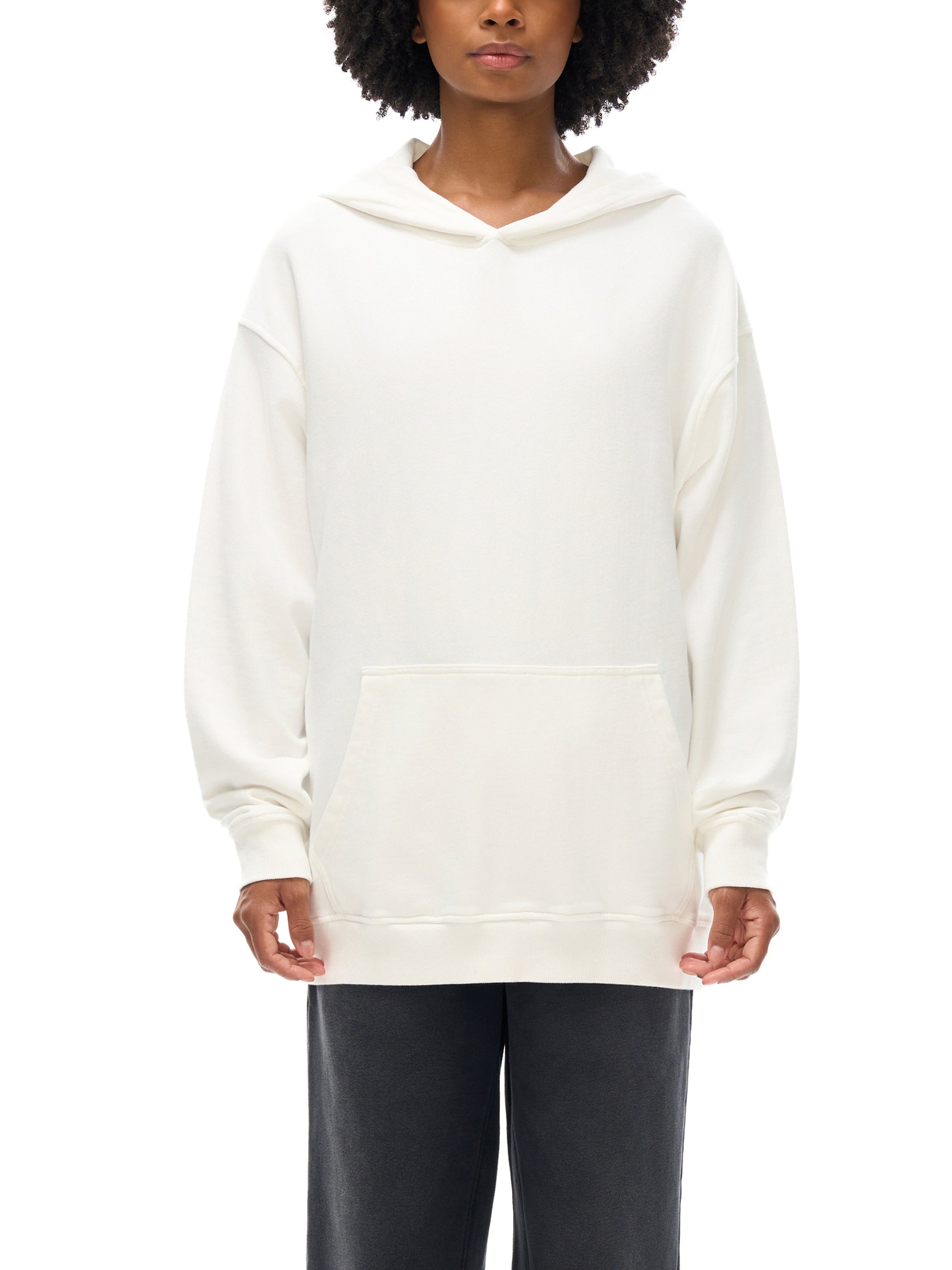 Model wearing VÉRON Majesté Dorée luxury unisex hoodie urban style 1