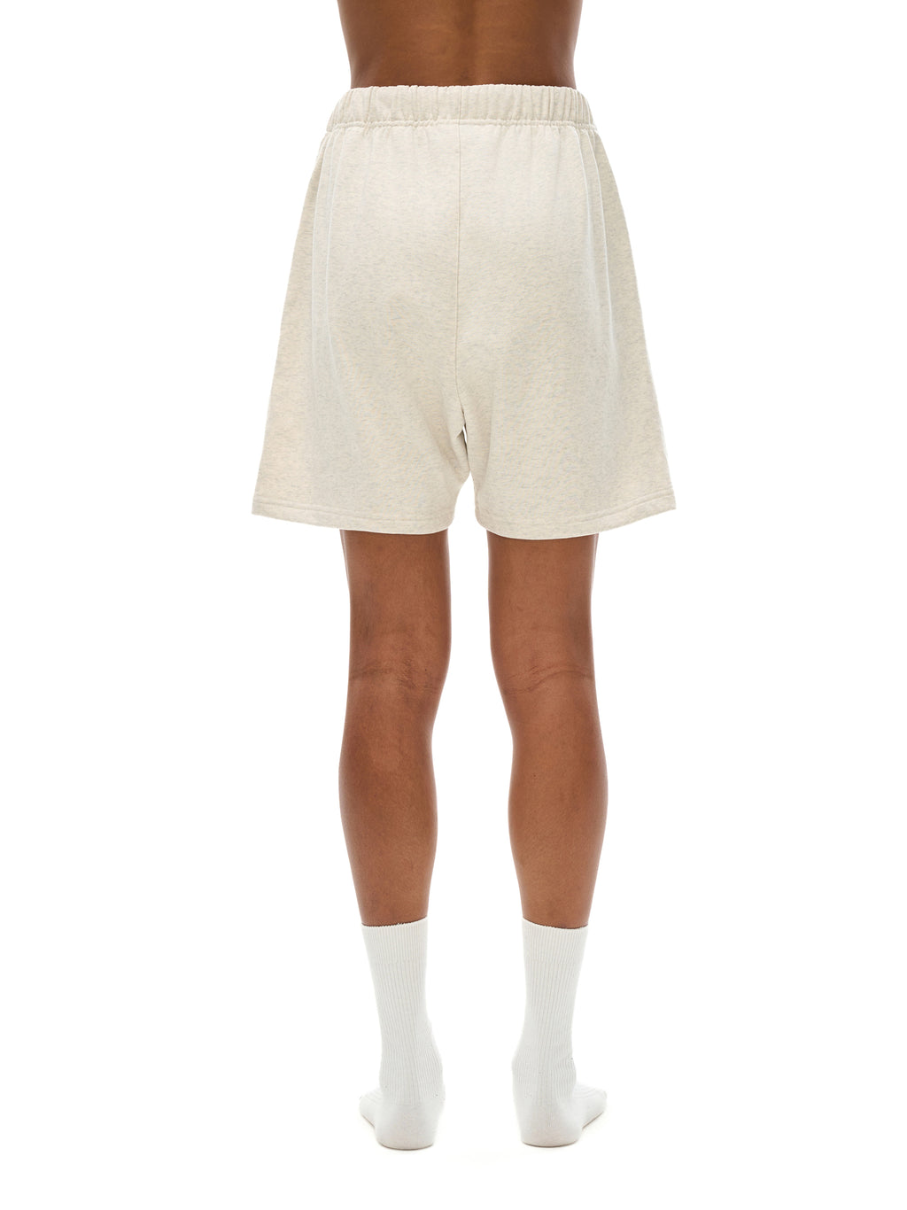 VERON Beige shorts worn by a person on a white background