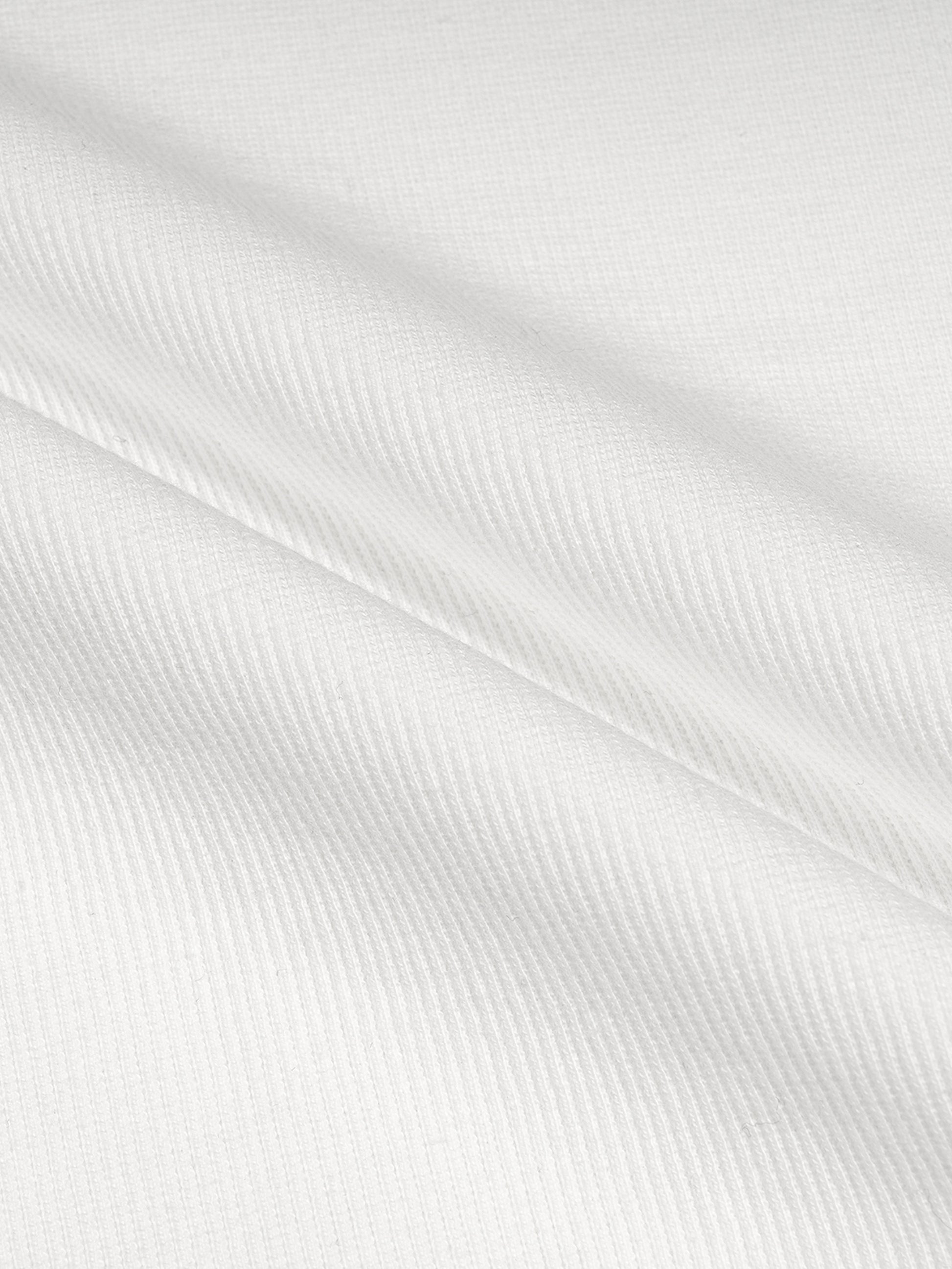 Close-up of ribbed cotton fabric texture for La Huchette VÉRON tee 5.

