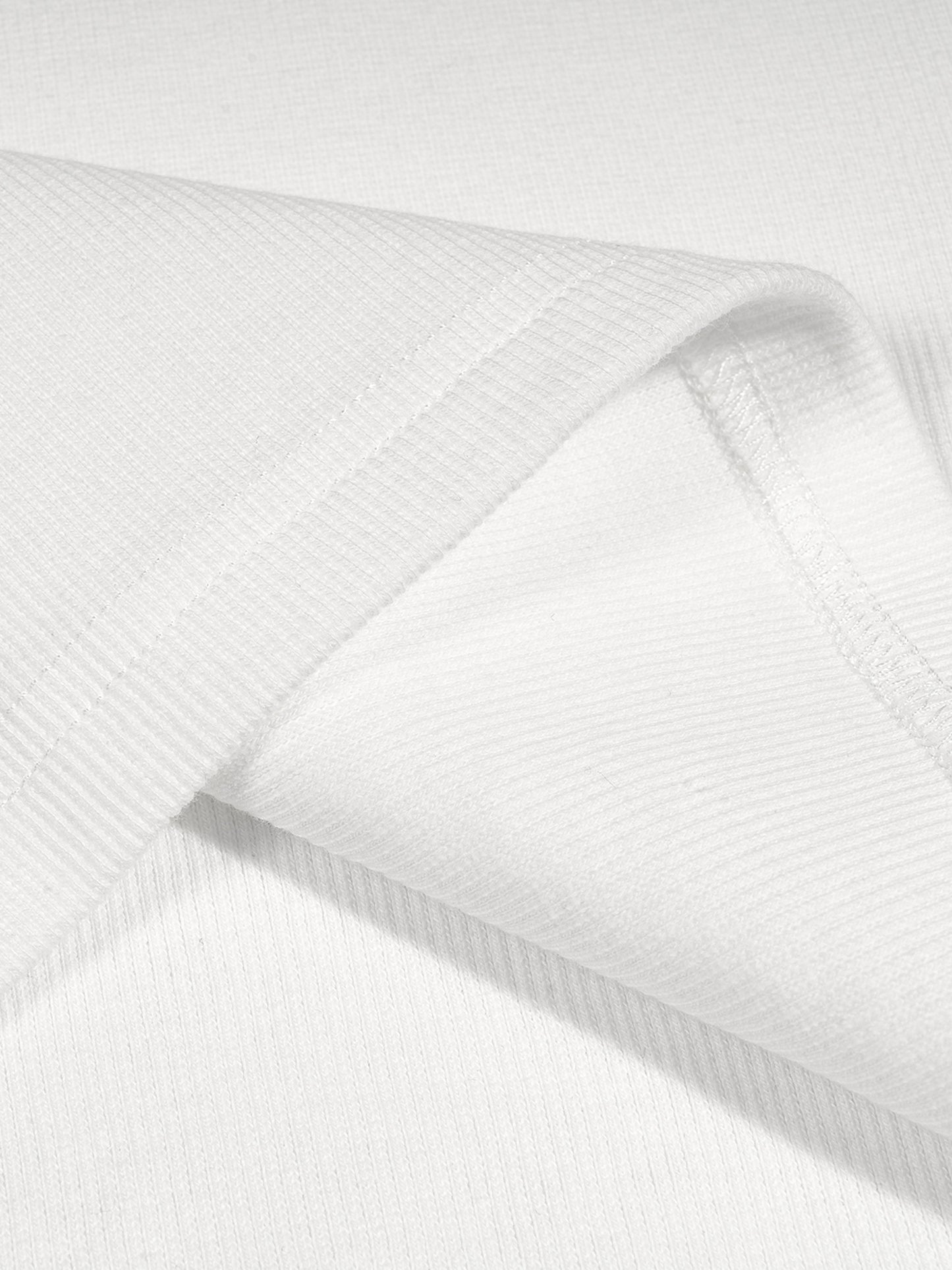 Close-up of ribbed cotton fabric texture for La Huchette VÉRON tee 3.

