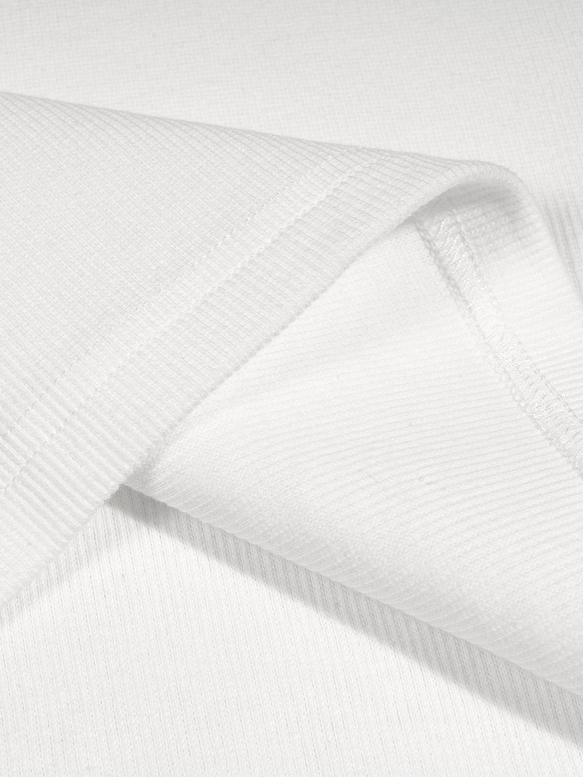 Close-up of ribbed cotton fabric texture for La Huchette VÉRON tee 3.

