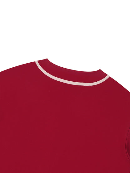Red shirt with white trim on a white background