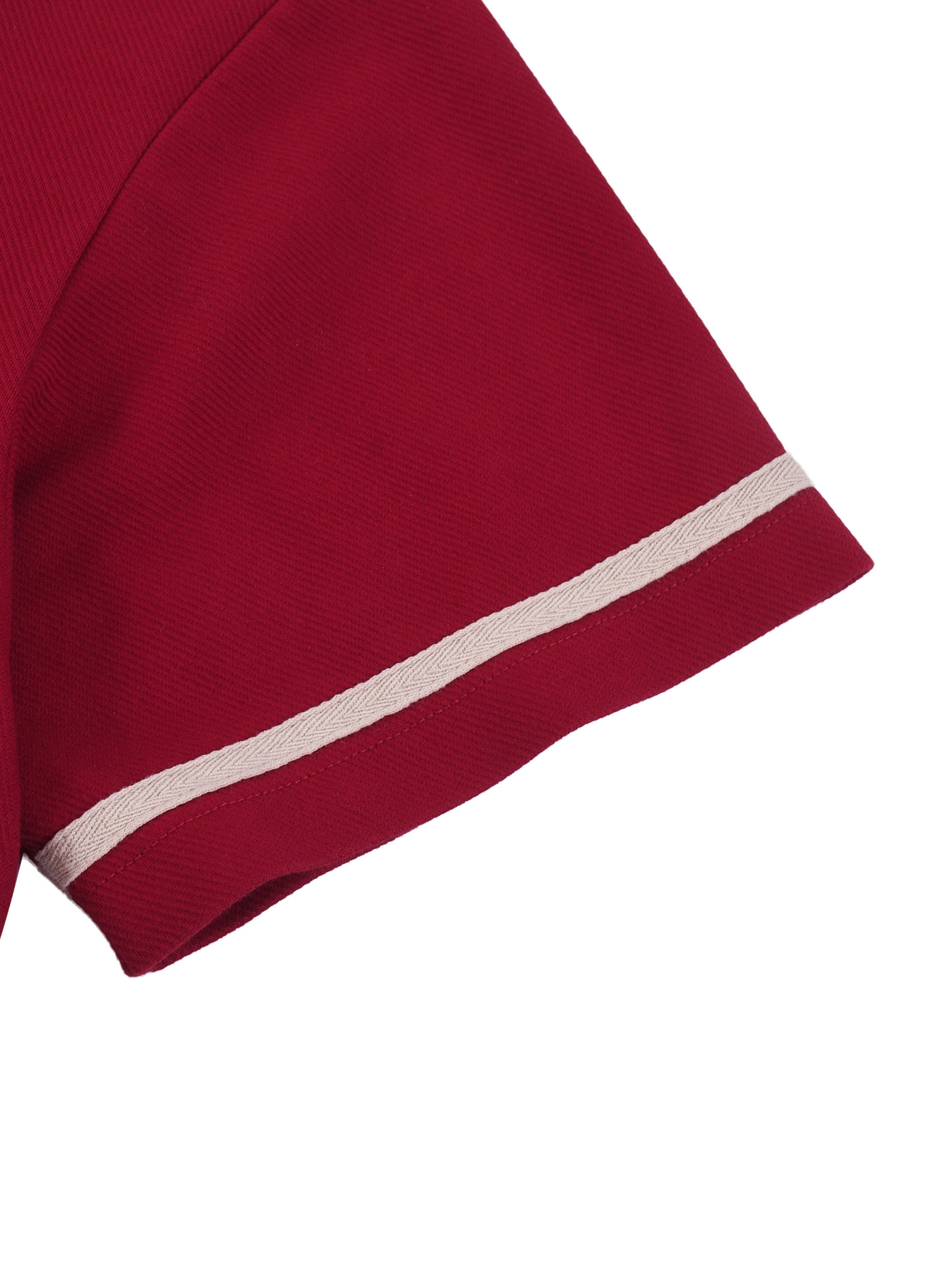 Side angle showing VÉRON button-up unisex shirt fit and fabric texture. 

