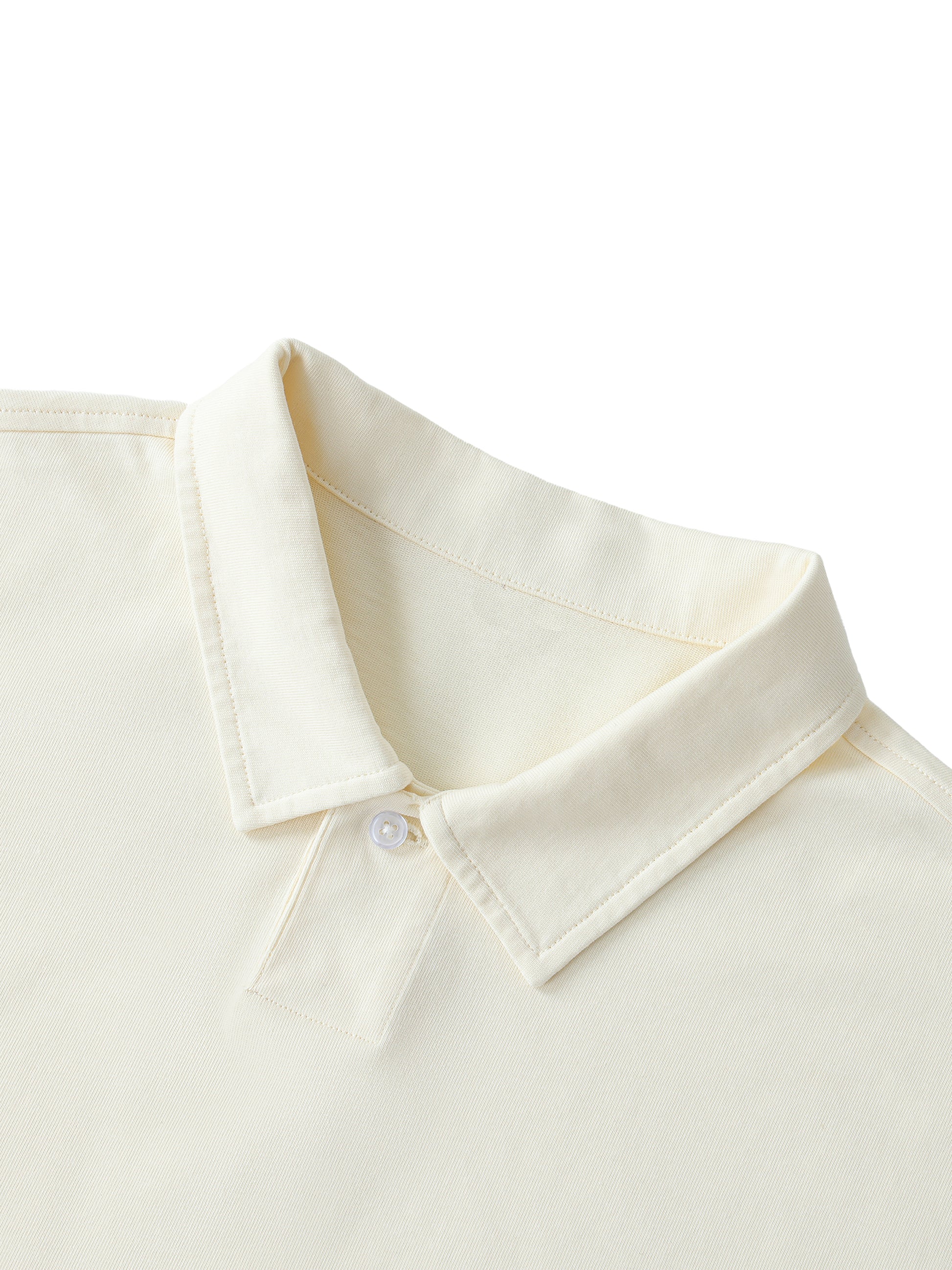 Close-up of VÉRON polo collar and premium fabric texture.