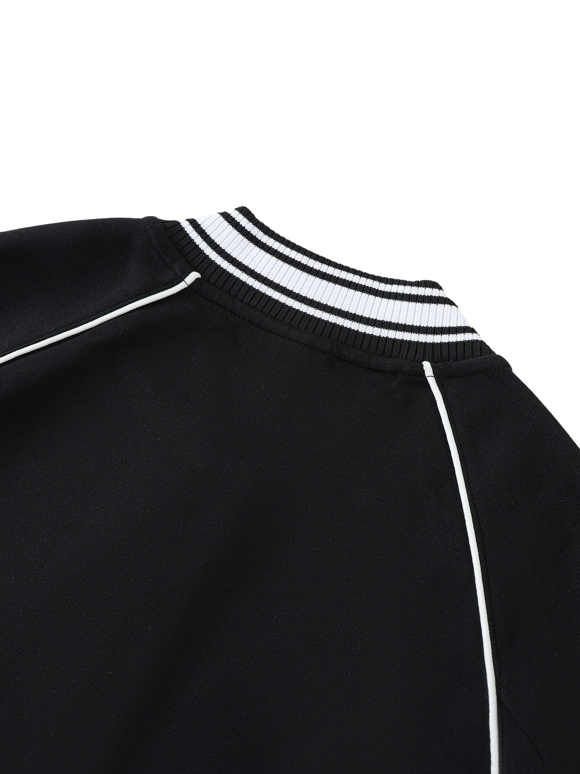 VERON Black jacket with white piping on a white background