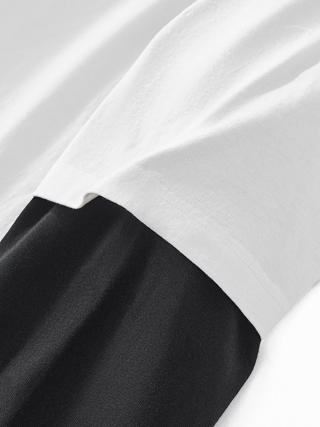 Premium heavyweight cotton fabric close-up on VÉRON long sleeve 3