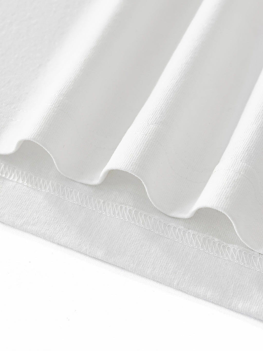 Premium heavyweight cotton fabric close-up on VÉRON long sleeve 2