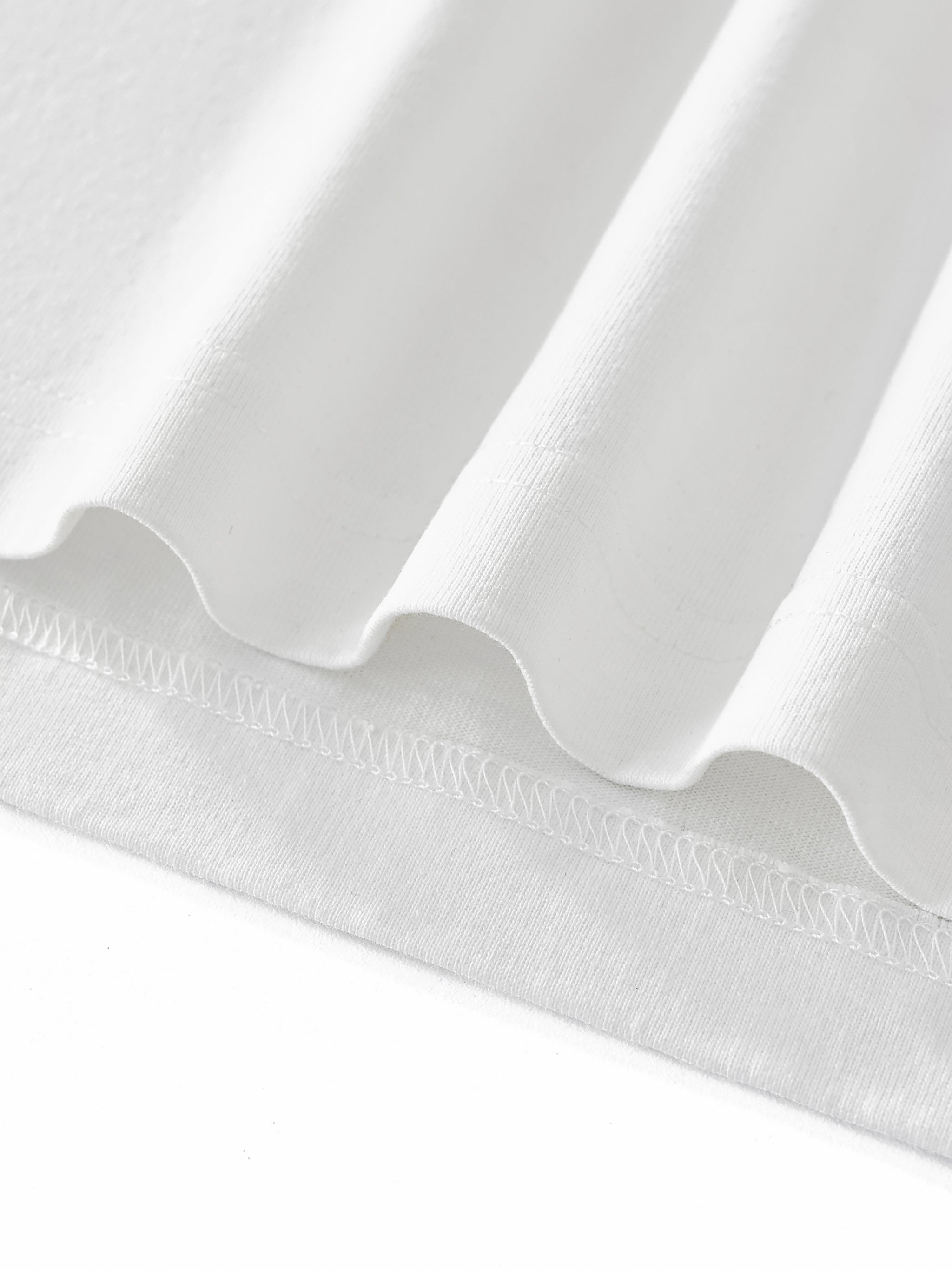 Premium heavyweight cotton fabric close-up on VÉRON long sleeve 2