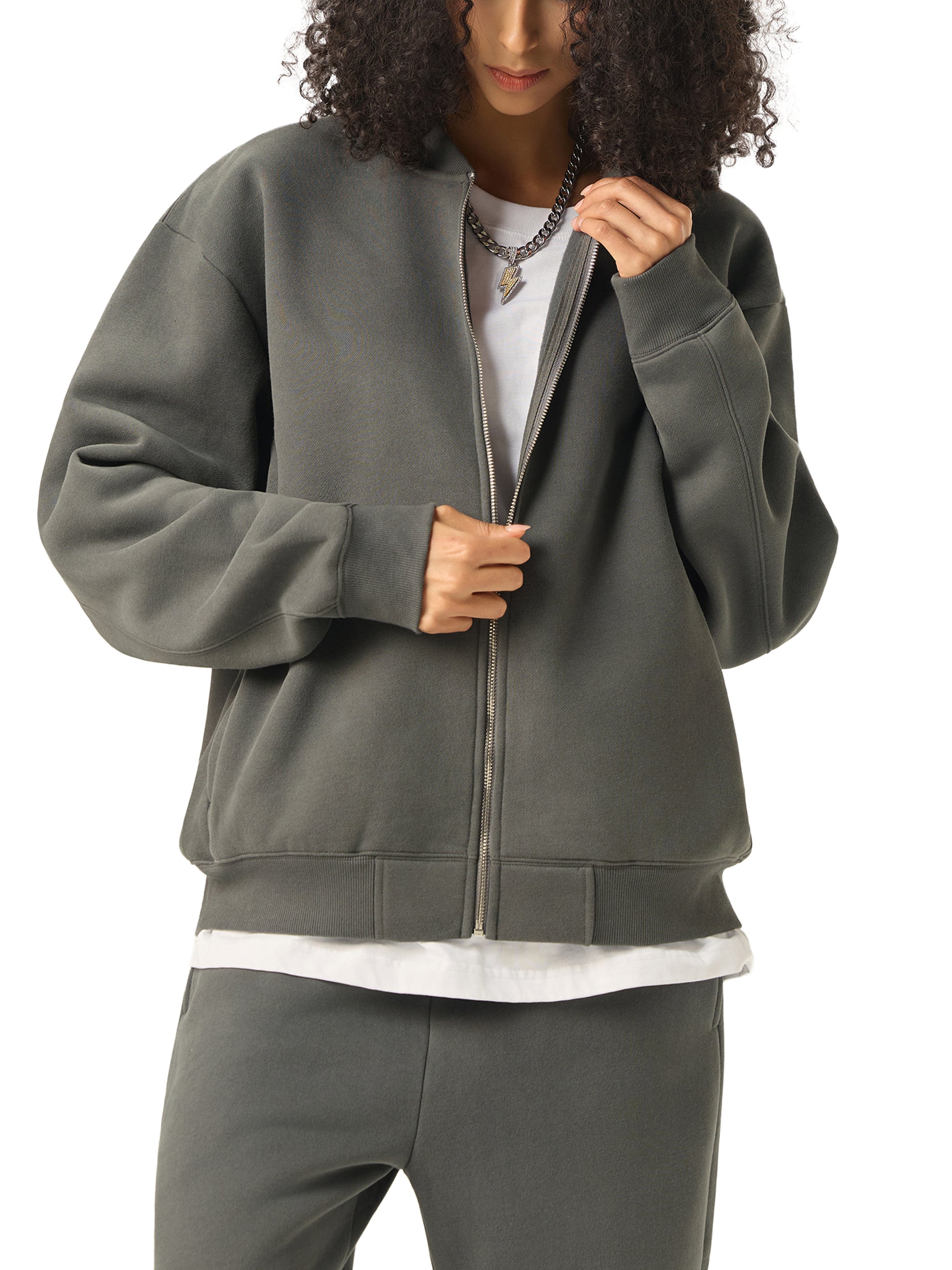 Model wearing VÉRON Oracle Suprême premium jacket in urban streetwear style