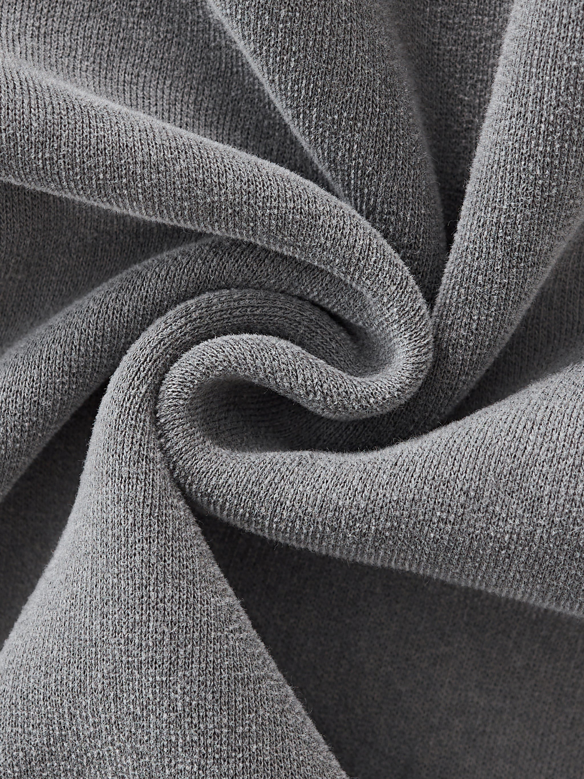Close-up of gray fabric with a textured pattern