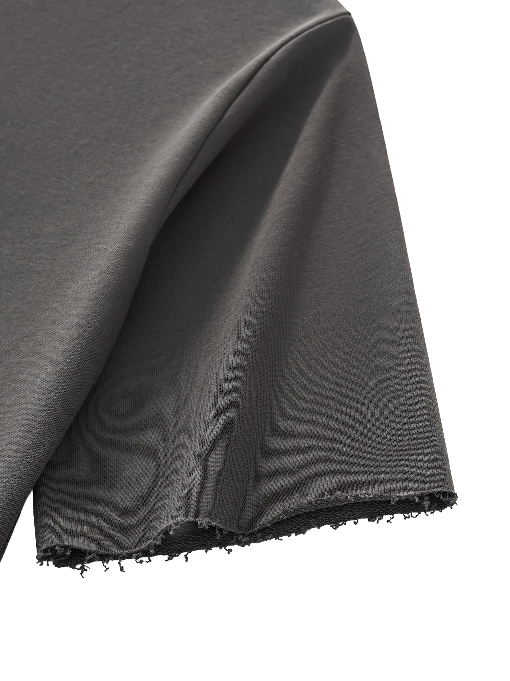 Dark gray fabric with a textured edge on a white background