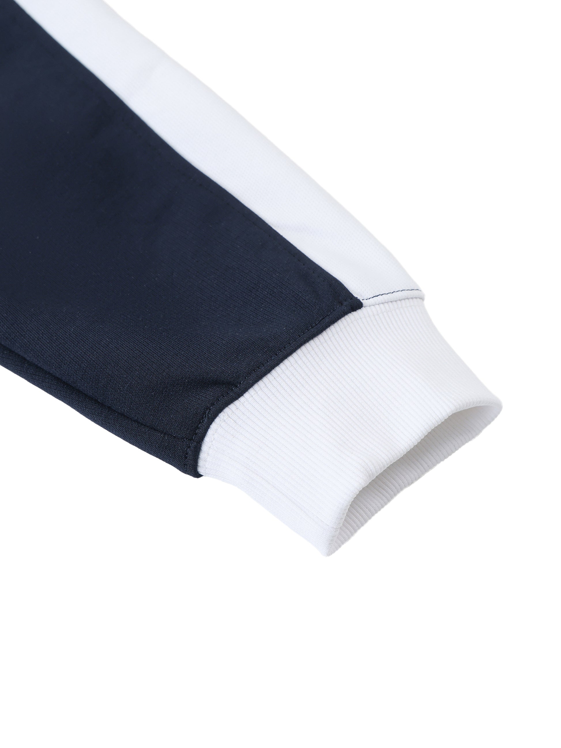 Close-up of a navy and white sports outfit on a white background