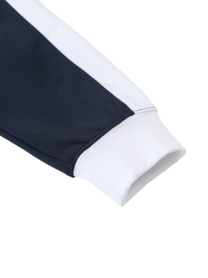 Close-up of a navy and white sports outfit on a white background