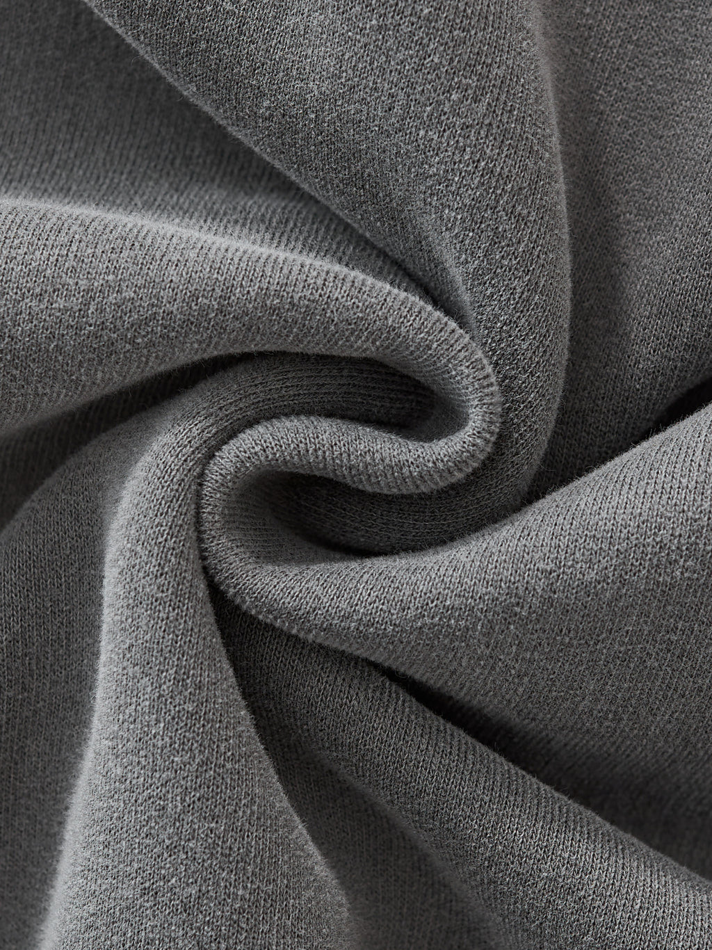 Close-up of gray fabric with a textured pattern