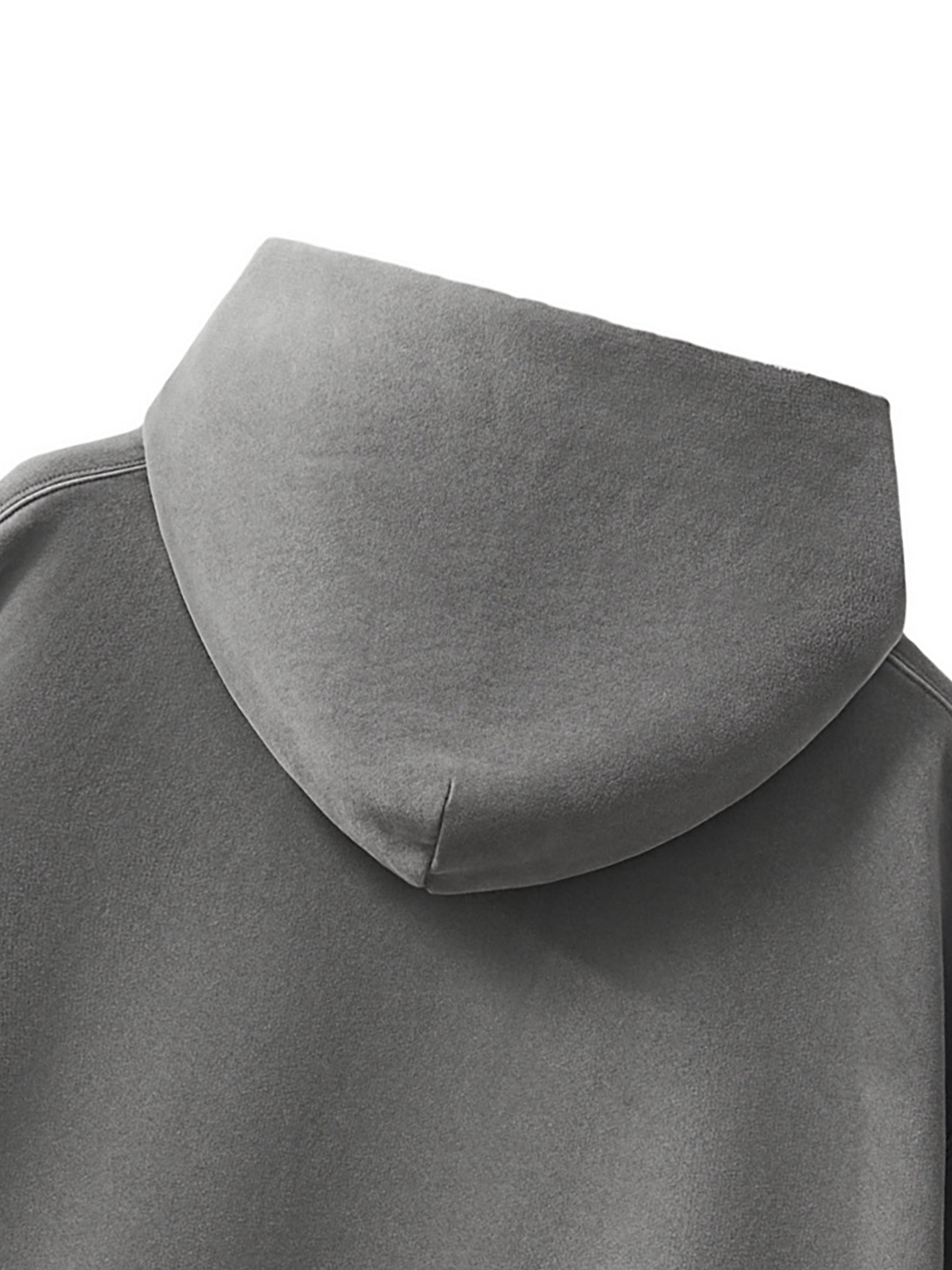 Close-up of a gray hood on a plain background