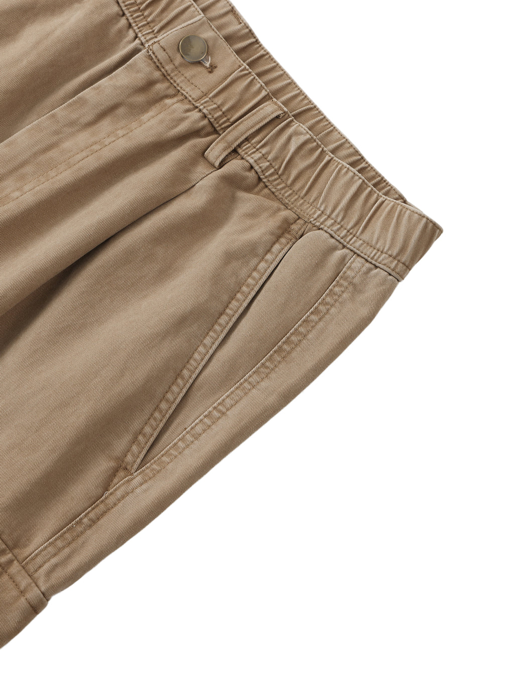 Close-up of beige pants on a white background