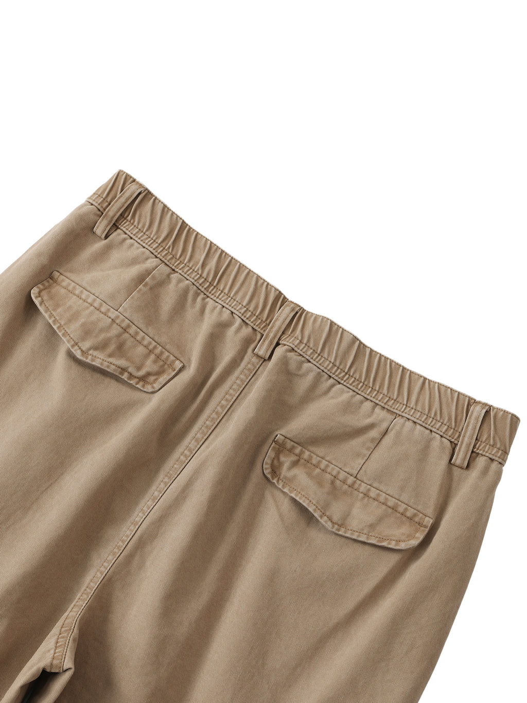 Close-up of beige pants with two pockets on a white background
