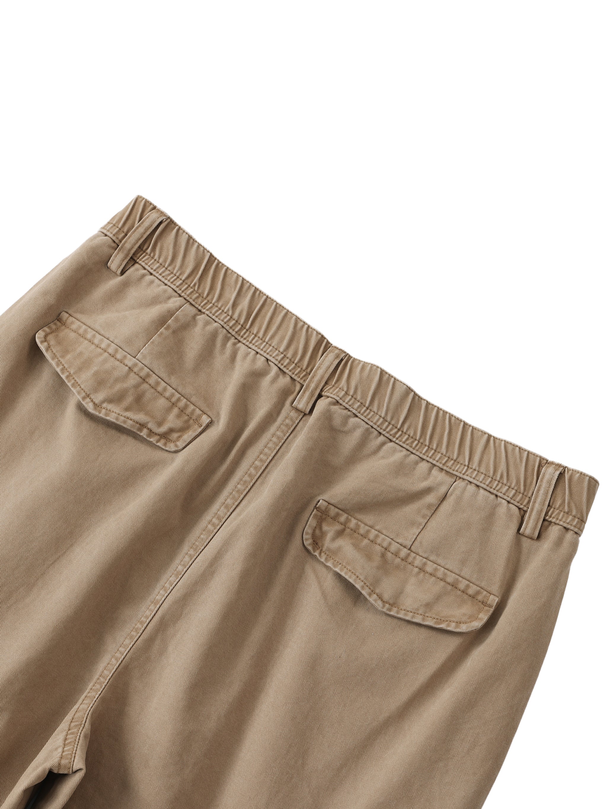Close-up of beige pants with two pockets on a white background