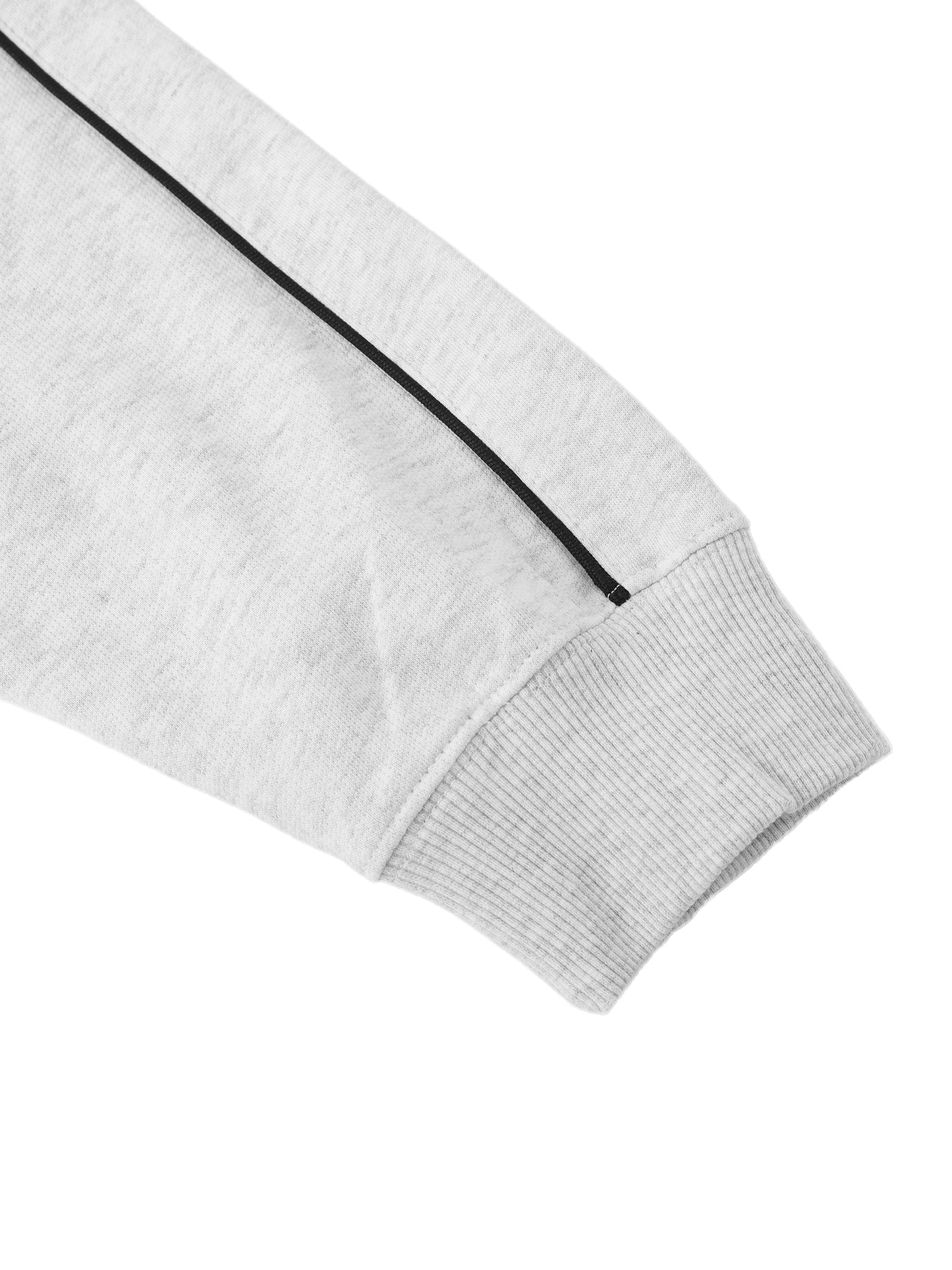 Close-up of a gray sweater with black piping on a white background