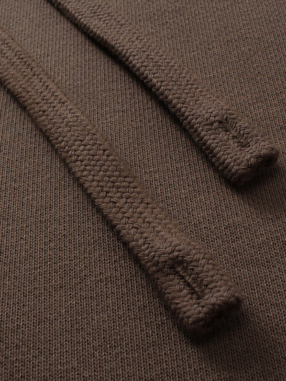 Close-up of a brown textured fabric with a focus on texture and pattern.