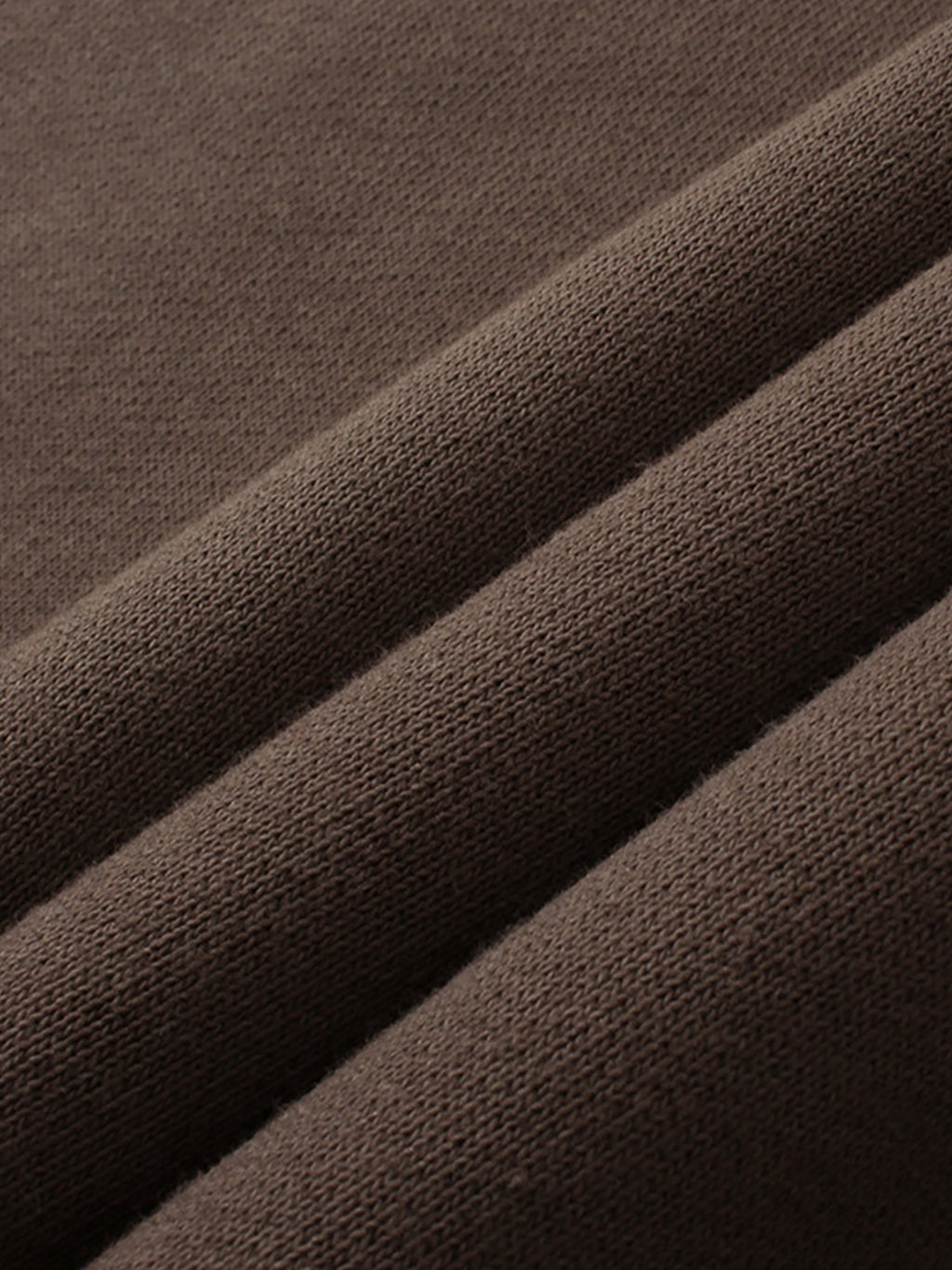 Close-up of brown fabric with visible texture