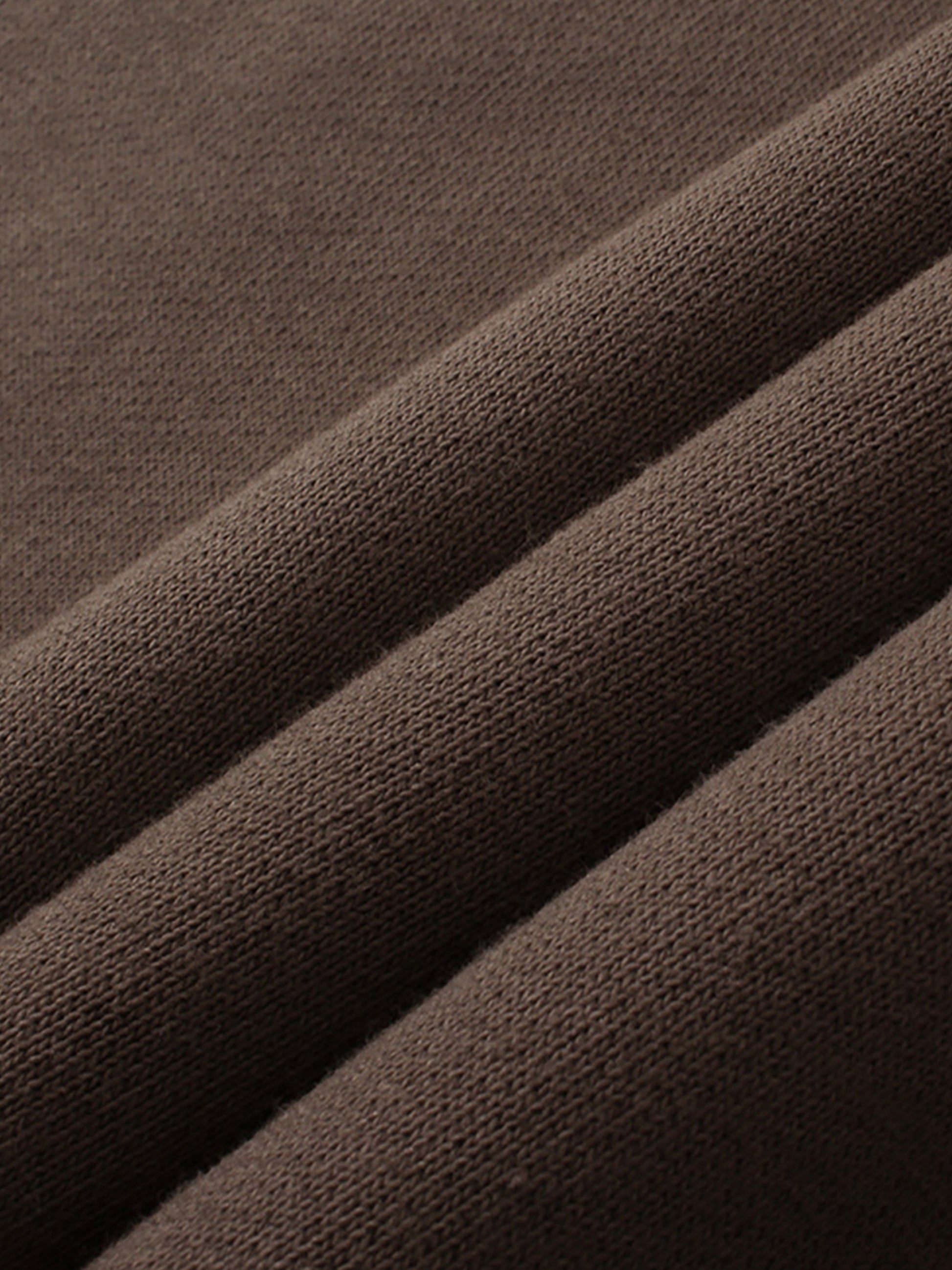 Close-up of brown fabric with visible texture