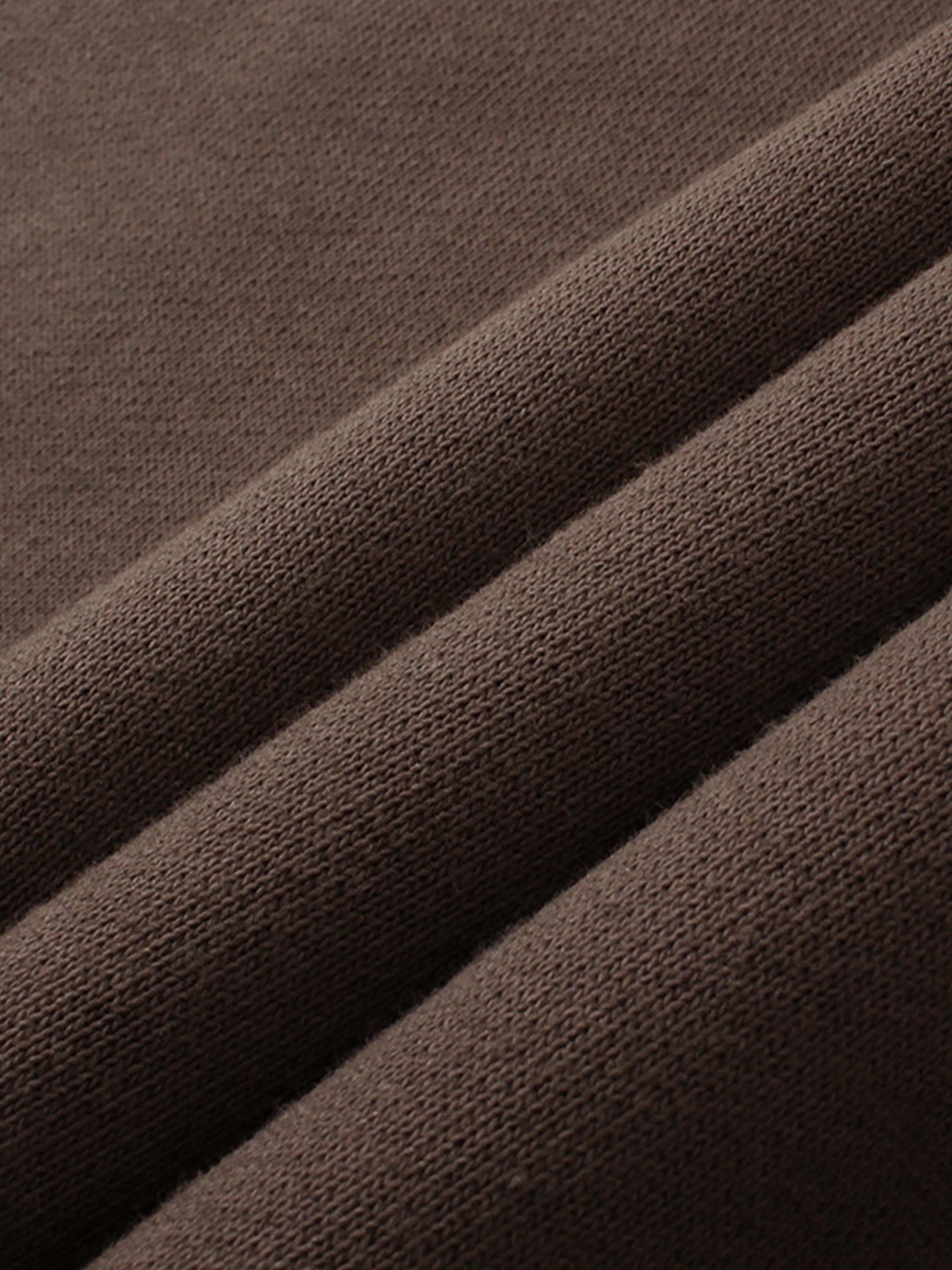Close-up of brown fabric with visible texture