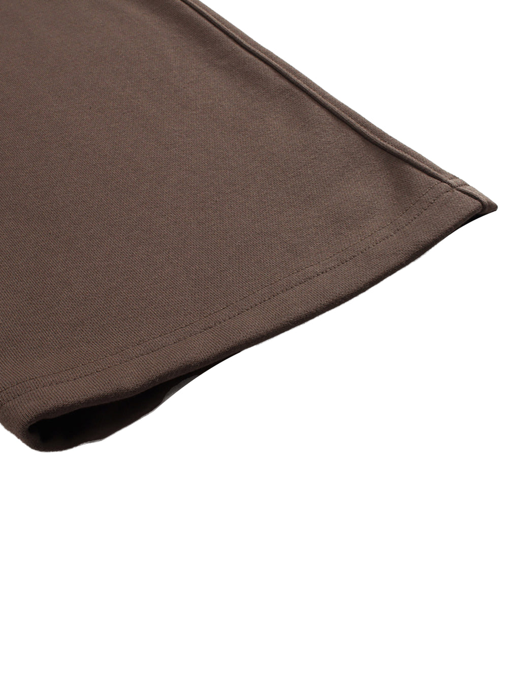 Close-up of a brown fabric corner on a white background