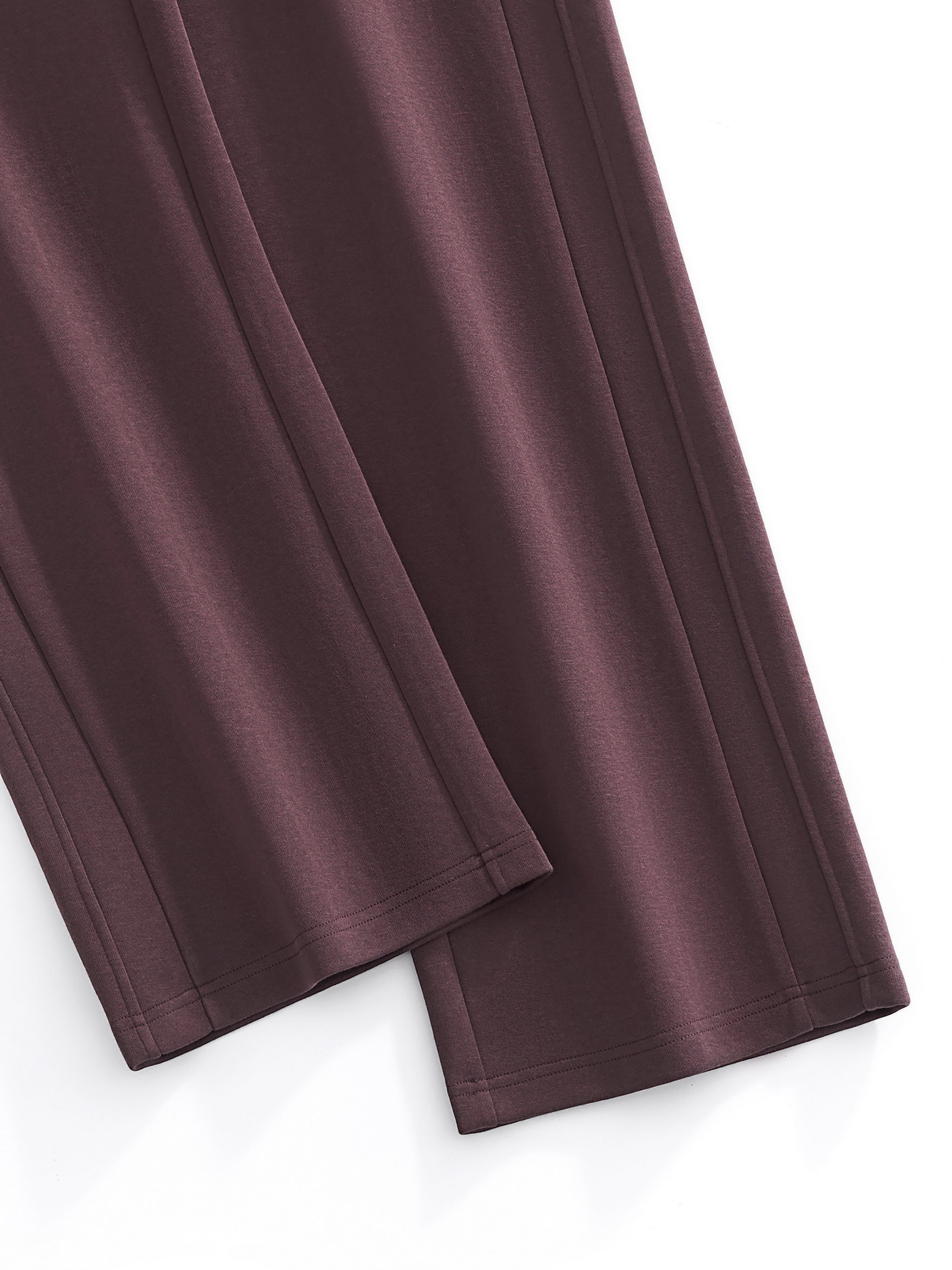 Close-up of a maroon skirt on a white background